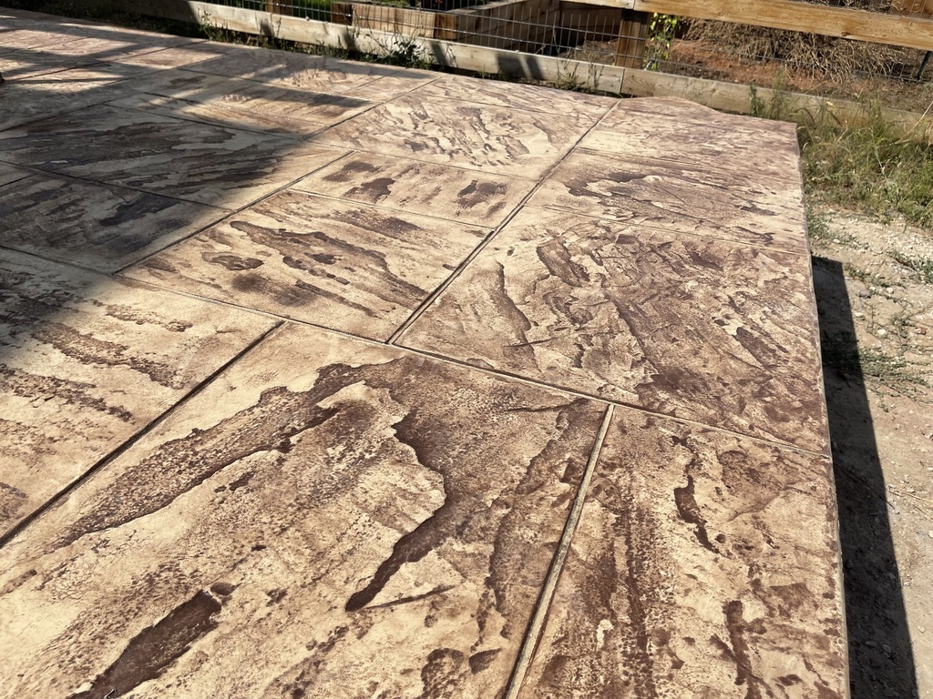 Custom patio and outdoor living area built by LNK Deck & Remodels